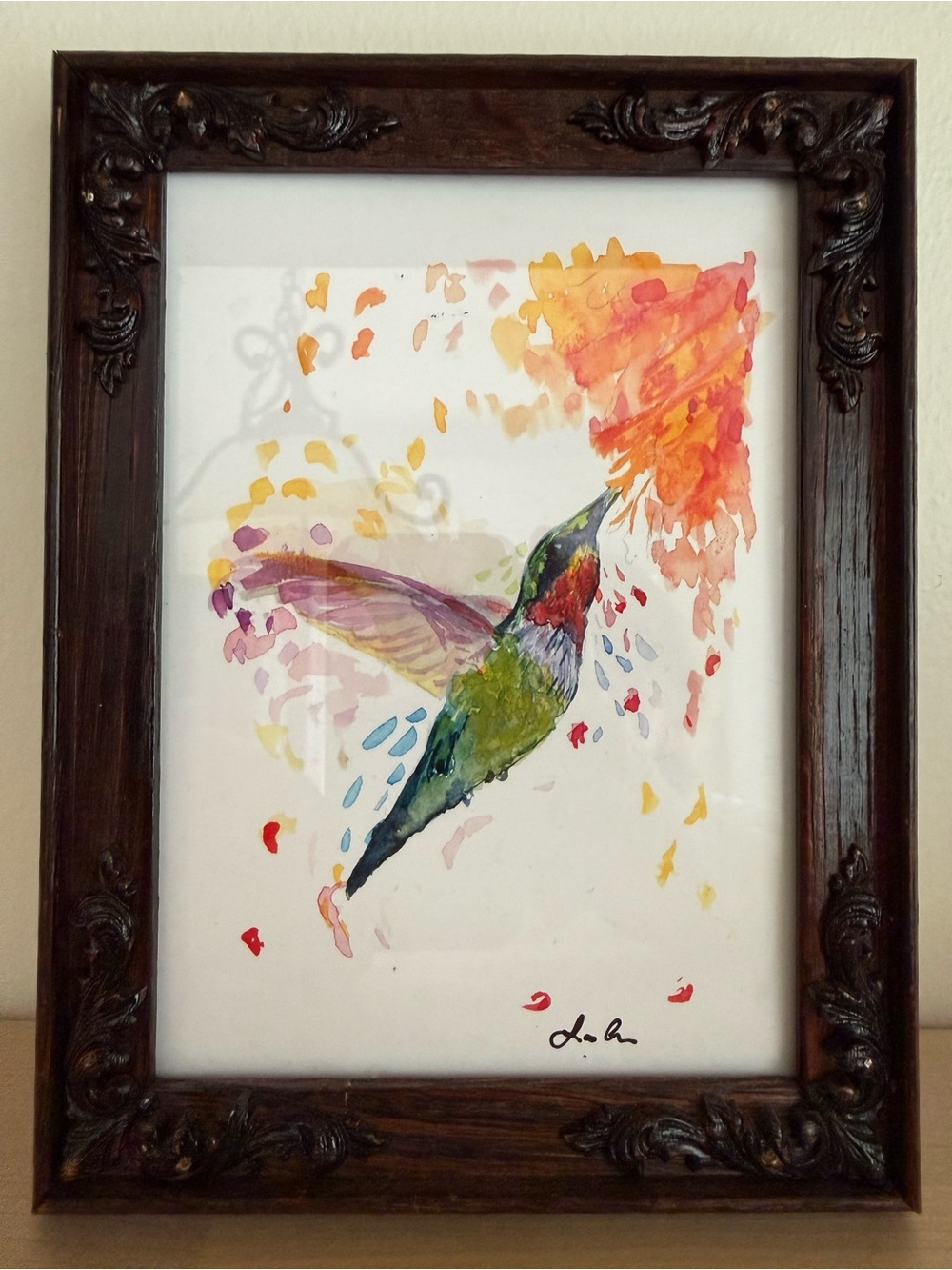 Watercolor Ruby Throated Hummingbird Art Print in Multicolor by Laura Cavallin